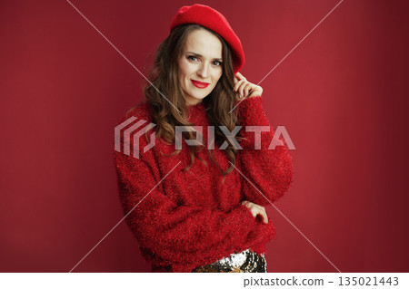 happy modern 40 years old woman in red sweater and beret 135021443