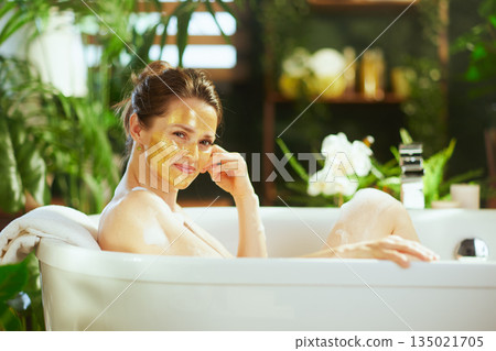 Smiling Bathtub Relaxation with Golden Mask 135021705