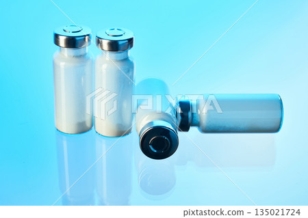 Glass vials containing powdered medicine for healthcare 135021724