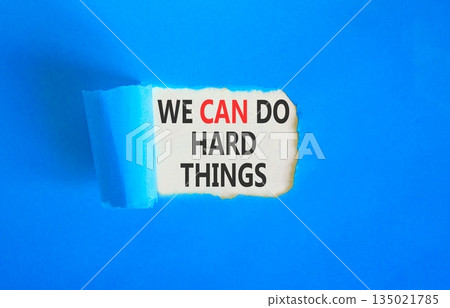 Support, help we can do hard things symbol. Concept words We can do hard things on beautiful white paper. Beautiful blue paper background. Business we can do hard things concept. Copy space. 135021785