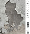 Peeling paint texture on weathered concrete wall showing signs of age and decay, perfect background 135022239