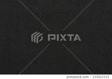 Fabric surface showing detailed texture in dark shade for design use Fabric surface showing detailed texture in dark shade for design use 135022315