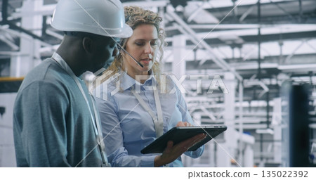 Two Specialists Solve Technical Issue in Vast Industrial Plant 135022392