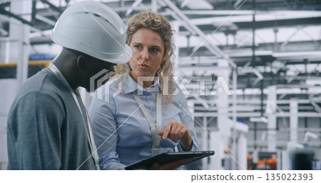 Two Specialists Solve Technical Issue in Vast Industrial Plant 135022393