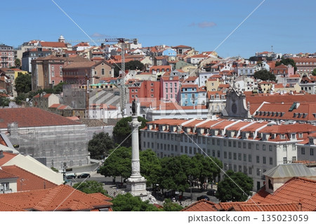 Close-up of Rossio Square Column and Colorful Cityscape in Lisbon 135023059
