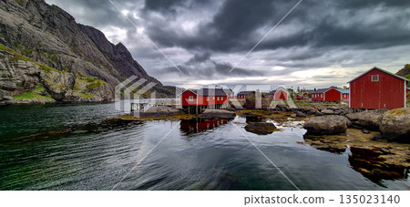 Old Fishermen Village Nusfjord With Rorbuer Huts And Calm Fjord On Lofoten Islands In Norway 135023140