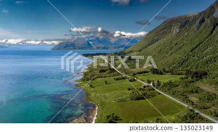 Coastal Landscape In Aerial View With Fjord And Snowy Mountains On Lofoten Islands In Norway 135023149
