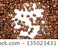 A collection of coffee beans on a white background. 135023431
