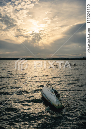 Sunken ship and sunset at Lake Hinuma Sunken ship and sunset at Lake Hinuma 135024820