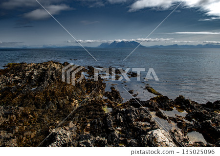 Spectacular Coast With Snowy Mountains On Andoya Island Of Lofoten In Norway Spectacular Coast With Snowy Mountains On Andoya Island Of Lofoten In Norway 135025096