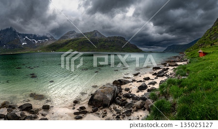 Small Red Hut On White Sand Beach On Lofoten Islands In Norway Small Red Hut On White Sand Beach On Lofoten Islands In Norway 135025127