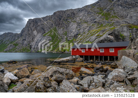 Old Fishermen Village Nusfjord With Rorbuer Huts And Calm Fjord On Lofoten Islands In Norway 135025128