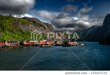 Old Fishermen Village Nusfjord With Rorbuer Huts And Calm Fjord On Lofoten Islands In Norway 135025132