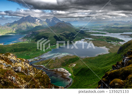 View From Offersoykammen Mountain Over Coastal Landscape On Lofoten Islands In Norway View From Offersoykammen Mountain Over Coastal Landscape On Lofoten Islands In Norway 135025133