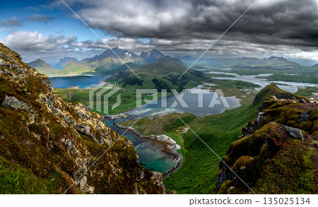 View From Offersoykammen Mountain Over Coastal Landscape On Lofoten Islands In Norway View From Offersoykammen Mountain Over Coastal Landscape On Lofoten Islands In Norway 135025134