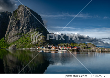 Picturesque Coastal Village Hamnoy With Red Rorbuer Huts On Lofoten Islands In Norway 135025170
