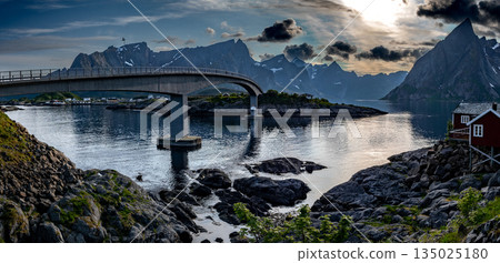 Picturesque Coastal Villages At Hamnoy And Sakrisoy With Midnight Sun On Lofoten Islands In Norway Picturesque Coastal Villages At Hamnoy And Sakrisoy With Midnight Sun On Lofoten Islands In Norway 135025180
