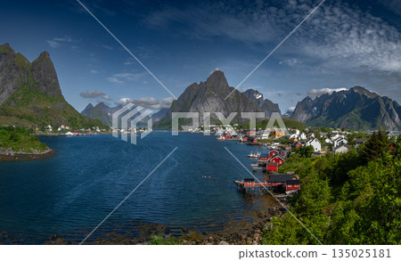 Village Reine With Mountains And Gravdalsbukta Near Reinebringen On Lofoten Islands In Norway Village Reine With Mountains And Gravdalsbukta Near Reinebringen On Lofoten Islands In Norway 135025181
