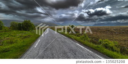 Abandoned Rural Road Through Moore Landscape On Andoya Island Of Lofoten In Norway Abandoned Rural Road Through Moore Landscape On Andoya Island Of Lofoten In Norway 135025208