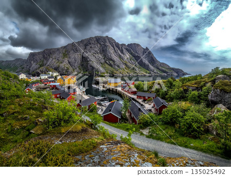 Old Fishermen Village Nusfjord With Rorbuer Huts And Calm Fjord On Lofoten Islands In Norway Old Fishermen Village Nusfjord With Rorbuer Huts And Calm Fjord On Lofoten Islands In Norway 135025492