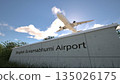 Airport departures scene at Bangkok Suvarnabhumi Airport with airplane climbing above terminal, Bangkok, Thailand 3D rendering 135026175