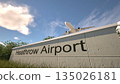 Departures at London Heathrow Airport with airplane leaving overhead, London, United Kingdom 3D rendering 135026181