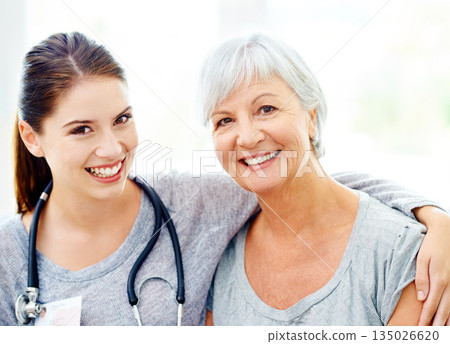 Retirement, happy portrait of caregiver and old woman in nursing home, trust and support in healthcare. Senior care, nurse visit and healthy elderly patient with happiness and doctor smile on face. 135026620