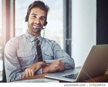 Businessman, laptop and portrait smile in call center, customer support or financial advice at office. Friendly man person or consultant agent with headphones for online consulting help at workplace Businessman, laptop and portrait smile in call center, customer support or financial advice at office. Friendly man person or consultant agent with headphones for online consulting help at workplace 135026634