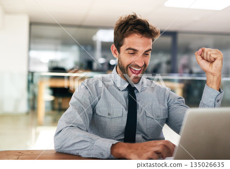 Business man, fist and celebrate with laptop, winning and promotion at startup with excited face. Young businessman, winner and celebration with computer, bonus or profit with trading on stock market Business man, fist and celebrate with laptop, winning and promotion at startup with excited face. Young businessman, winner and celebration with computer, bonus or profit with trading on stock market 135026635