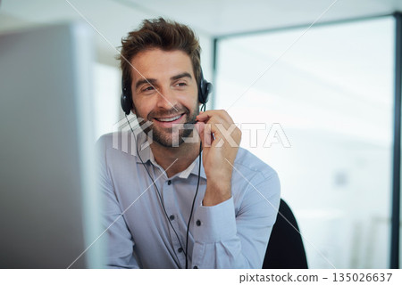 Call center, employee and man with telemarketing, customer service and conversation for advice. Male person, consultant and happy agent with headphones, communication and consulting with tech support 135026637