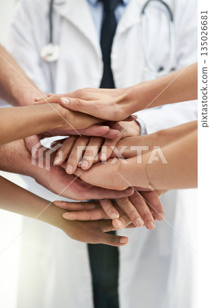 Teamwork, motivation and support with hands of doctors for medical, collaboration and solidarity. Medicine, healthcare and expert with closeup of people in meeting for target, goals and mindset Teamwork, motivation and support with hands of doctors for medical, collaboration and solidarity. Medicine, healthcare and expert with closeup of people in meeting for target, goals and mindset 135026681