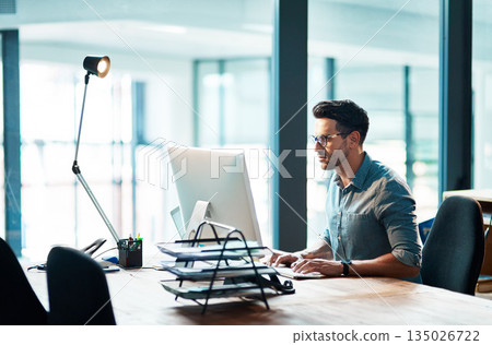 Business man, computer and focused in office for planning strategy, online research and typing at desk. Worker, desktop and website connection for digital project, internet software or admin analysis 135026722