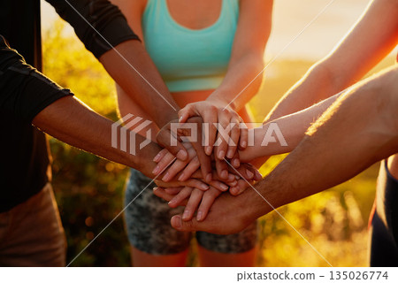 Hands together, fitness friends and outdoor with motivation, workout and teamwork in nature. Exercise, sport and people with hand in sign for support, training and motivation with solidarity and sun Hands together, fitness friends and outdoor with motivation, workout and teamwork in nature. Exercise, sport and people with hand in sign for support, training and motivation with solidarity and sun 135026774