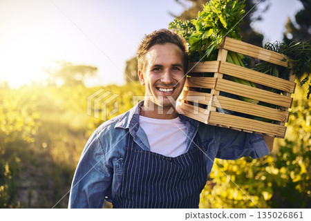 Man, farm and crate with produce in portrait with harvest, success and happiness for agriculture. Male farmer, box and leaves for vegetables, growth and happy in countryside for sustainable business Man, farm and crate with produce in portrait with harvest, success and happiness for agriculture. Male farmer, box and leaves for vegetables, growth and happy in countryside for sustainable business 135026861