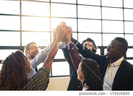 Business people, group and high five for teamwork, collaboration or team building in office. Hands of diversity men and women together for corporate support, solidarity and mission or motivation 135026885