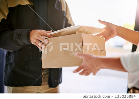 Customer, box and delivery man giving package at home from courier company. Logistics worker at front door of woman or client with a parcel in cardboard for e commerce shipping or mail distribution 135026894