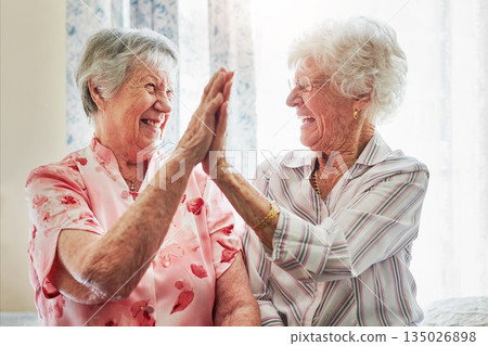 Happy, love and senior women with a high five for care, retirement support and happiness. Smile, team and elderly friends with excited gesture for solidarity or lifestyle in a nursing home together 135026898