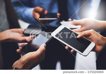 Business people, hands and phone screen with connectivity in a office with online data. Contact, collaboration and web management team on mobile with sales charts and social network for planning Business people, hands and phone screen with connectivity in a office with online data. Contact, collaboration and web management team on mobile with sales charts and social network for planning 135026969