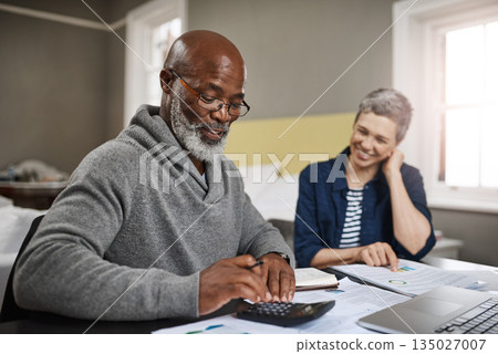 Calculator, documents or finance with an old couple busy on a budget review in the home together. Accounting, taxes or investment with a senior man and interracial woman planning insurance or savings Calculator, documents or finance with an old couple busy on a budget review in the home together. Accounting, taxes or investment with a senior man and interracial woman planning insurance or savings 135027007