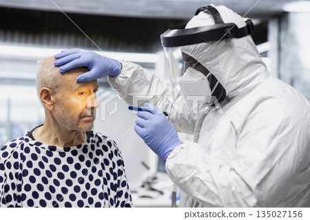 Black medic working in a virology unit with contagious man in modern lab, studying bacteria and immune response for disease prevention and treatment breakthrough. Prevention center. 135027156