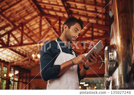 Tablet, search and brewery with man in factory for production, manufacturing and alcohol fermentation. Technology, inspection and digital with business owner for distillery, beer and quality control Tablet, search and brewery with man in factory for production, manufacturing and alcohol fermentation. Technology, inspection and digital with business owner for distillery, beer and quality control 135027248