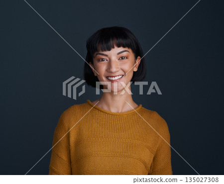 Woman with smile in portrait, happy and confident with young person isolated on blue background. Youth, gen z and female model in studio with mockup space, positive mindset and happiness Woman with smile in portrait, happy and confident with young person isolated on blue background. Youth, gen z and female model in studio with mockup space, positive mindset and happiness 135027308