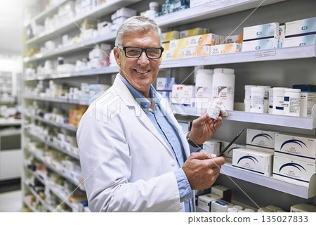 Pharmacy, medicine and tablet with portrait of man at shelf in store for stock, inspection and inventory. Medical, healthcare and pills with senior pharmacist for technology, wellness and product Pharmacy, medicine and tablet with portrait of man at shelf in store for stock, inspection and inventory. Medical, healthcare and pills with senior pharmacist for technology, wellness and product 135027833
