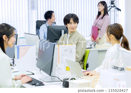 People working in the office People working in the office 135028427