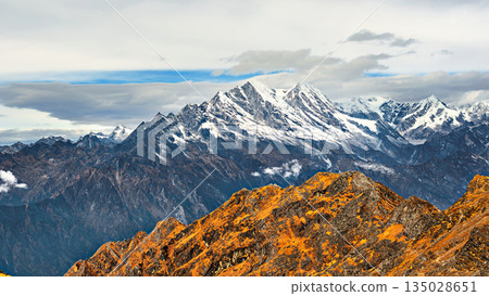 The Himalayan mountain landscape on the trekking route from Thule Kharka to Lukla at Zatrwa la Pass on Mera Peak trek in Nepal. The Himalayan mountain landscape on the trekking route from Thule Kharka to Lukla at Zatrwa la Pass on Mera Peak trek in Nepal. 135028651
