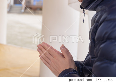 Hands of a man praying together Hands of a man praying together 135029300