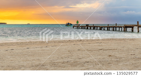 Beautiful sunset in San Blas Island at politically autonomous Guna territory in Panama. Beautiful sunset in San Blas Island at politically autonomous Guna territory in Panama. 135029577