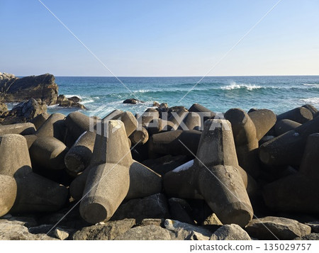 waves breaking on the rocks waves breaking on the rocks 135029757