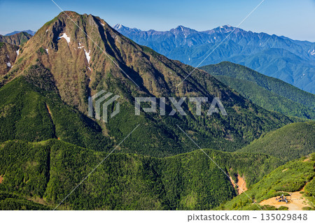 Amidadake and the Southern Alps seen from the Yatsugatake mountain range and Iodake 135029848