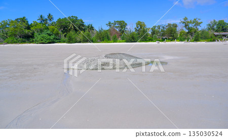 Lone Granite Rock on Wide White Sand Beach of Sungailiat Bangka Island During Low Tide 135030524